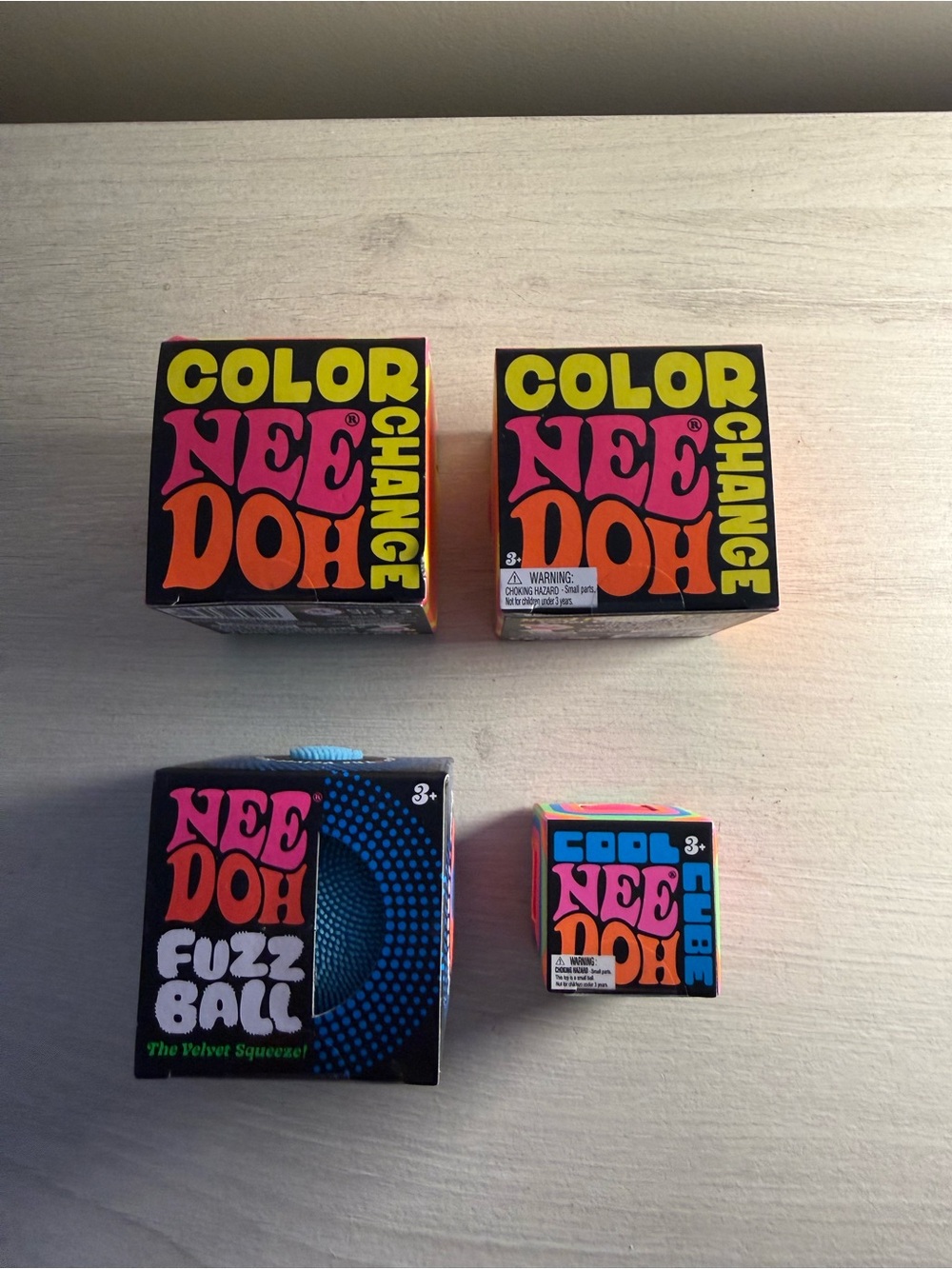 NeeDoh Color Change & Fuzz Ball Toy Boxes - Bright Multi - Lot of 4